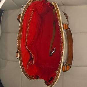 Dooney and Bourke light cream zip zip bag